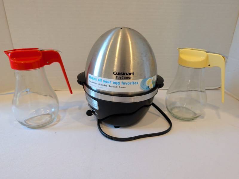 lot 1309 image: Cuisinart Egg Central Egg Cooker and syrup bottles