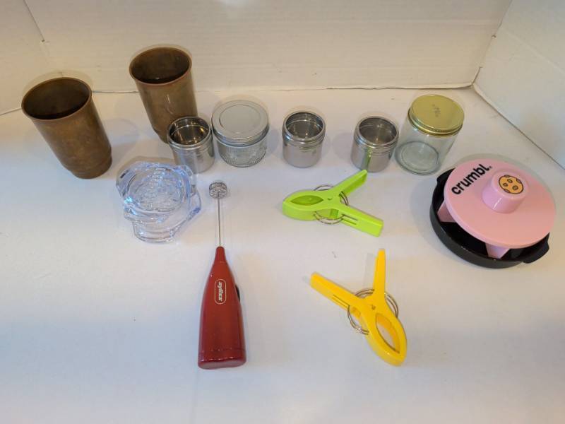 lot 1315 image: Assorted Kitchen Lot Zyliss Milk Frother, Crumbl Cookie Press, Jars, Copper Cups, Clips