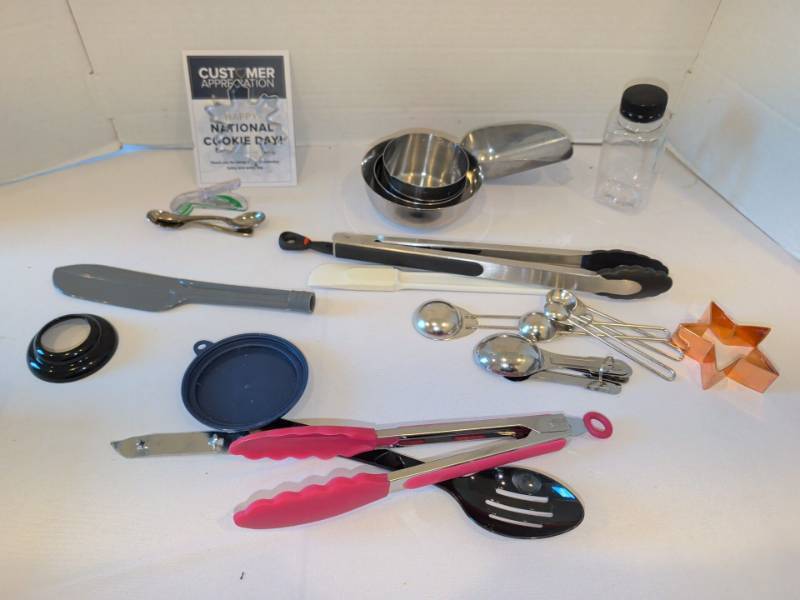 lot 1327 image: Kitchen Utensil Lot Measuring Spoons, Measuring Cups, Tongs, Cookie Cutters