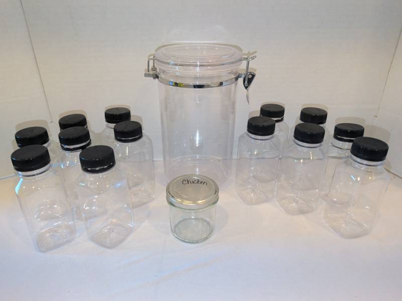 lot 1334 image: Clear Canister with Clamp Lid Lot Including Square Bottles and Small Jar