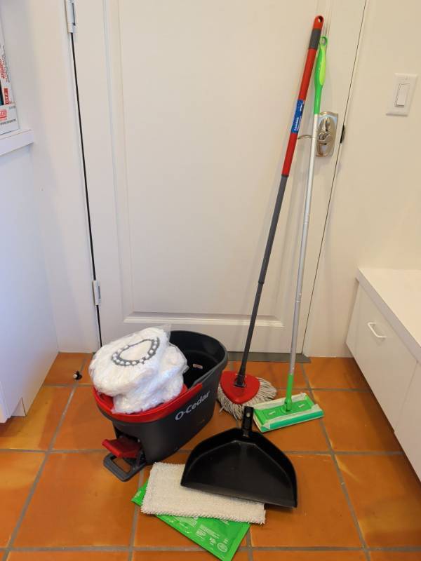 lot 1335 image: Swiffer Sweeper and O-Cedar mop, Pet Mopping Cloths 3 Ct and Dustpan