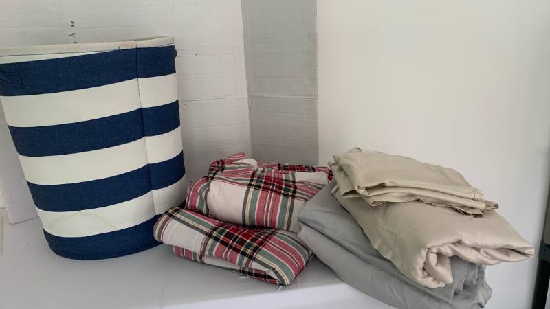 lot 1401 image: Misc full and Queen sheets with hamper