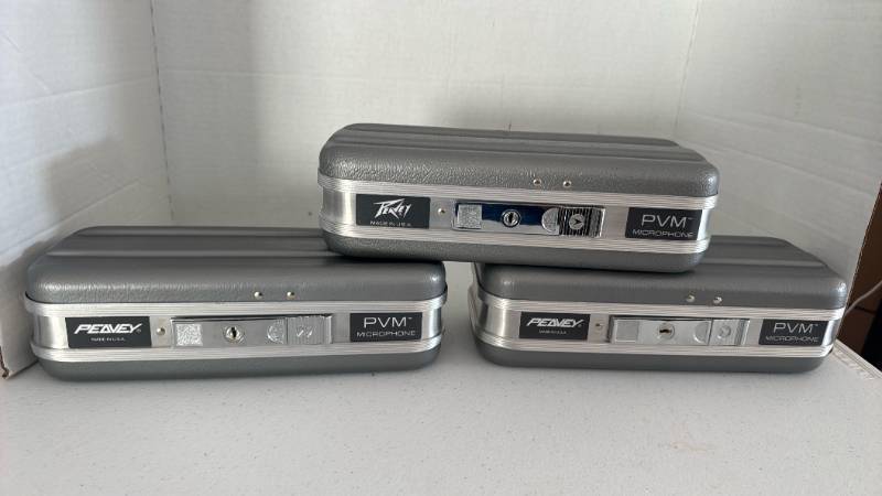 lot 1500 image: Silver hard shell cases for Peavey PVM series microphones