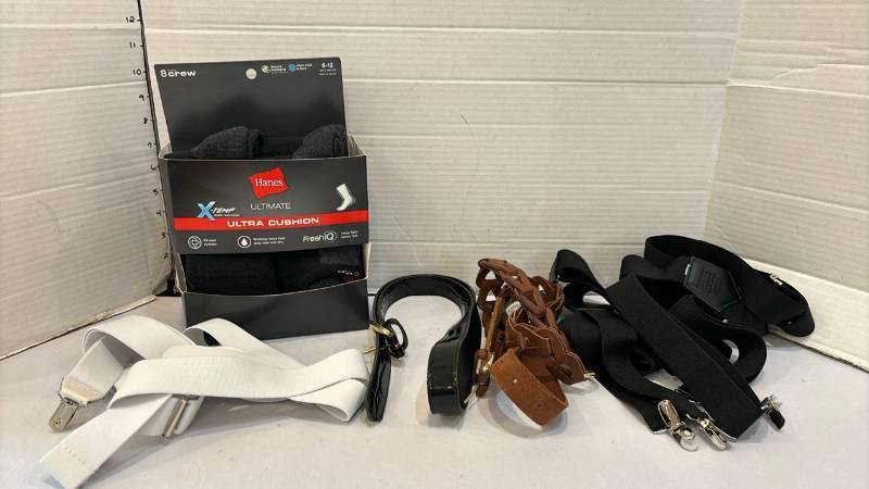 lot 1709 image: Mixed lot of mens accessories. Includes a Hanes Ultimate X-Temp Ultra Cushion crew sock box labeled 6-12 (mens shoe size) and 6 crew, plus suspenders and belts.