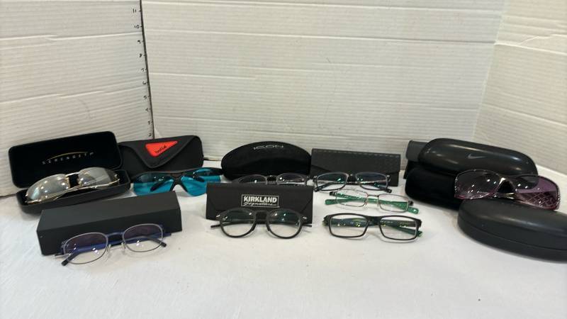 lot 1710 image: Mixed Brand prescription Eyeglass and Sunglass Lot with Cases