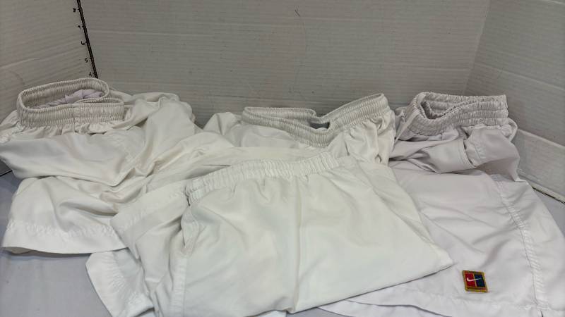 lot 1739 image: Four swim shorts - M