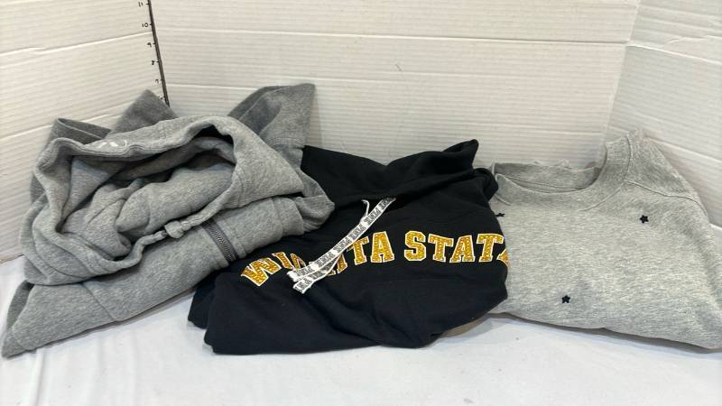 lot 1740 image: PINK Wichita State Hoodie Sweatshirt and two other sweatshirts
