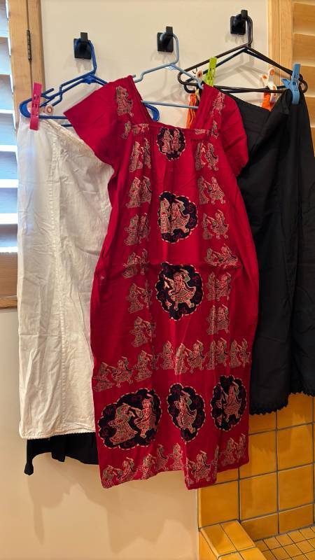 lot 1769 image: Four skirts and a dress