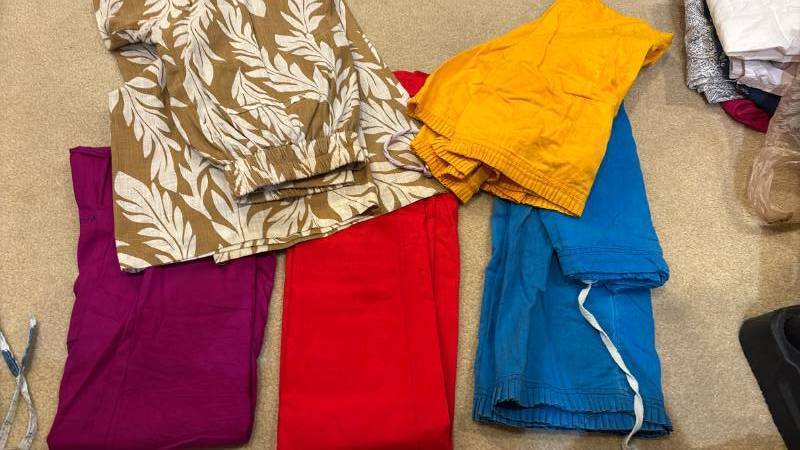 lot 1794 image: Lot of 4 skirts with Drawstring Waist and one pair of wide leg brown and white pants