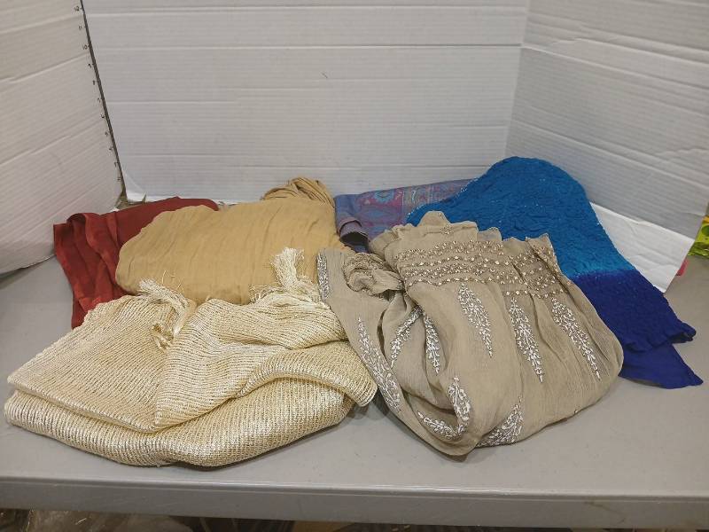 lot 1828 image: Lot of Assorted Fabric Scarves and Wraps in Various Colors