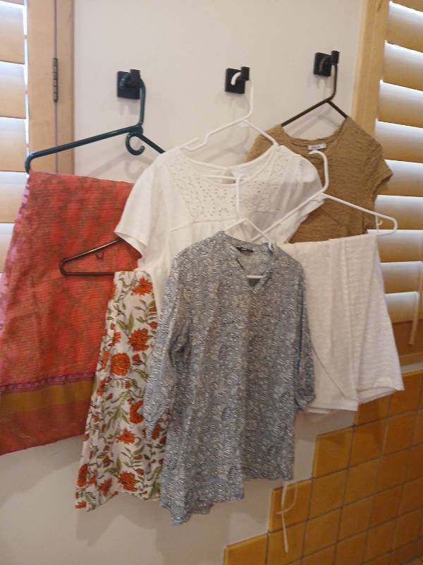 lot 1872 image: Ladies skirts and tops small med large