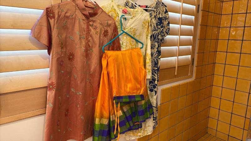 lot 1877 image: Ladies dresses and skirt