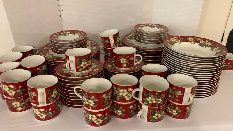 lot 2054 image: Red Dinnerware Set with White Floral and Holly Pattern Gold Rim Cups Saucers Plates 100 plus pieces