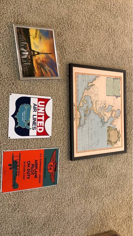 lot 2080 image: Wall decor Lot Framed North America Map, Eiffel Tower Print, United and Phillips 66 metal Signs 25x19 and smaller