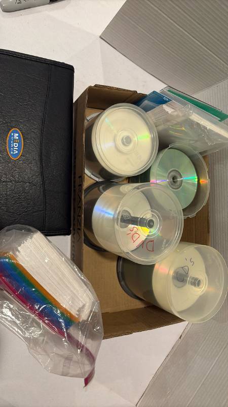 lot 2119 image: Blank DVDs and holder