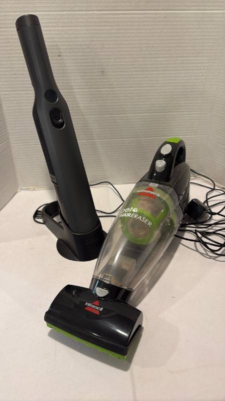 lot 2141 image: Mini vacuums. Shark works. Bissell would not charge.