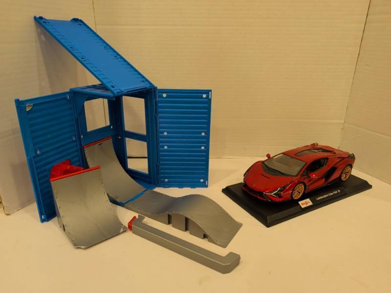 lot 2221 image: Maisto Lamborghini Si�n FKP 37 Display Model with Tech Deck Container Ramp Set