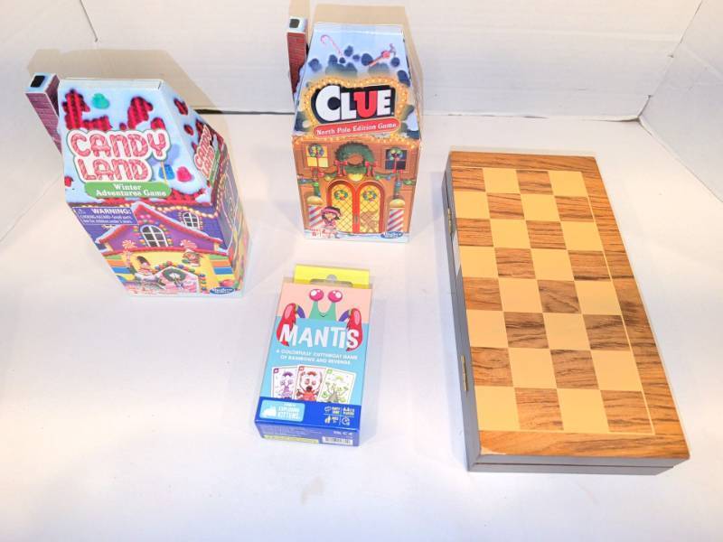 lot 2224 image: Games Lot Candy Land Winter Adventures, Clue North Pole Edition, Mantis, Chess