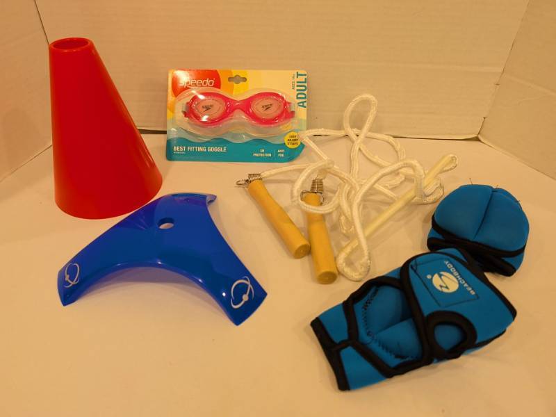 lot 2270 image: Mixed Fitness Lot Speedo Boomerang Adult Goggles, Beachbody Wrist Weights, Jump Rope