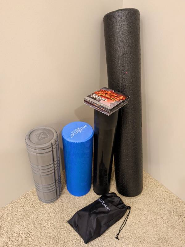 lot 2271 image: Insanity Beachbody DVD Set with 4 Exercise Rollers and Carrying Bag Lot