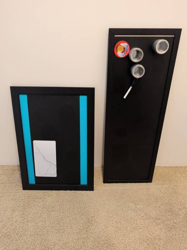 lot 2276 image: Black Framed Magnetic Boards 2 Piece Lot with 3 Magnetic Tins