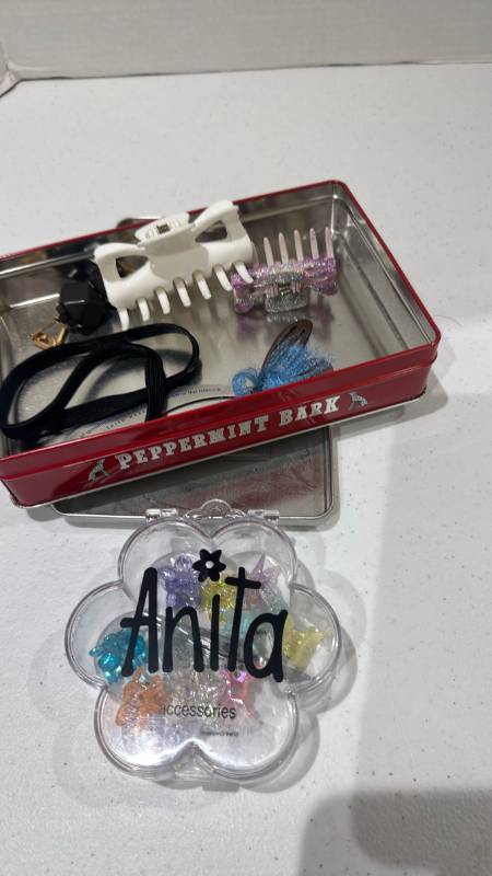 lot 2315 image: Hair Claw Clip Lot with Flower Case and Peppermint Bark Tin