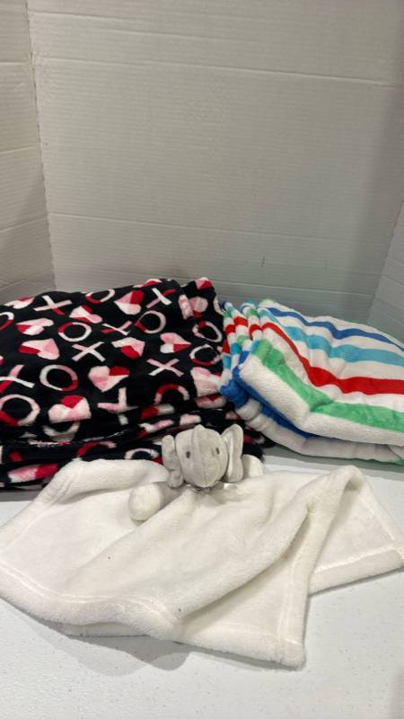 lot 2316 image: Blanket Lot with Gray Elephant Lovey, Black XOXO and Striped Blankets