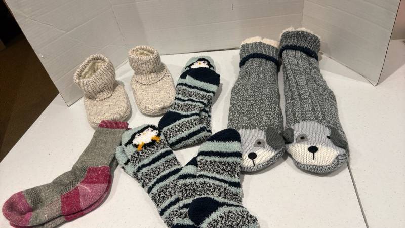 lot 2329 image: Assorted Socks and Booties Lot Penguin and Animal Face Designs
