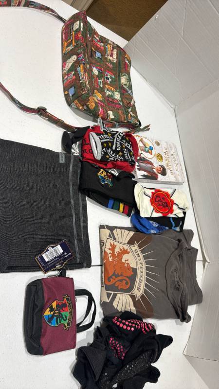 lot 2340 image: Harry Potter Clothing Lot 24 Fortune Teller Valentines Shirt, Socks, and more