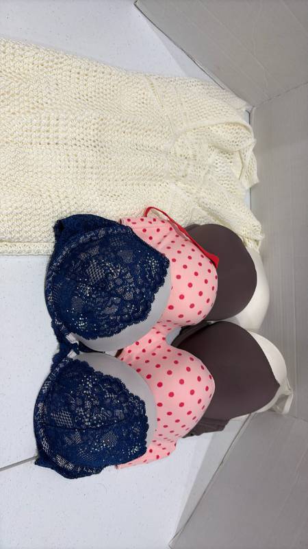 lot 2351 image: Victorias Secret&nbspSecret bras 38C, and a swimsuit coverup.