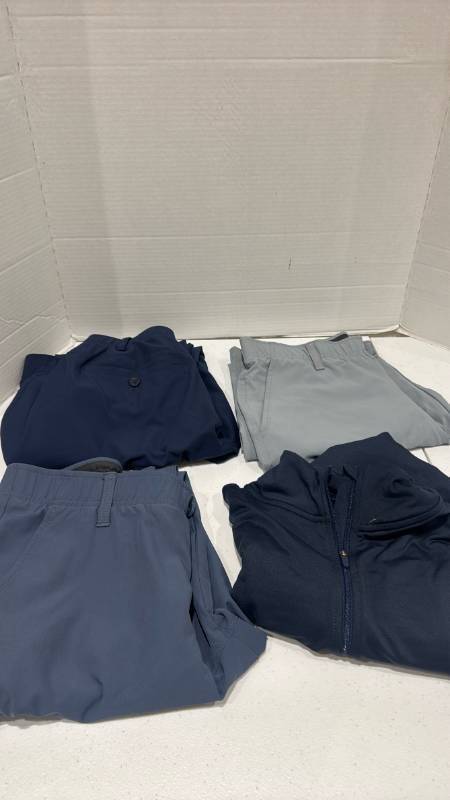 lot 2375 image: Nike jacket L and under armor pants 3230