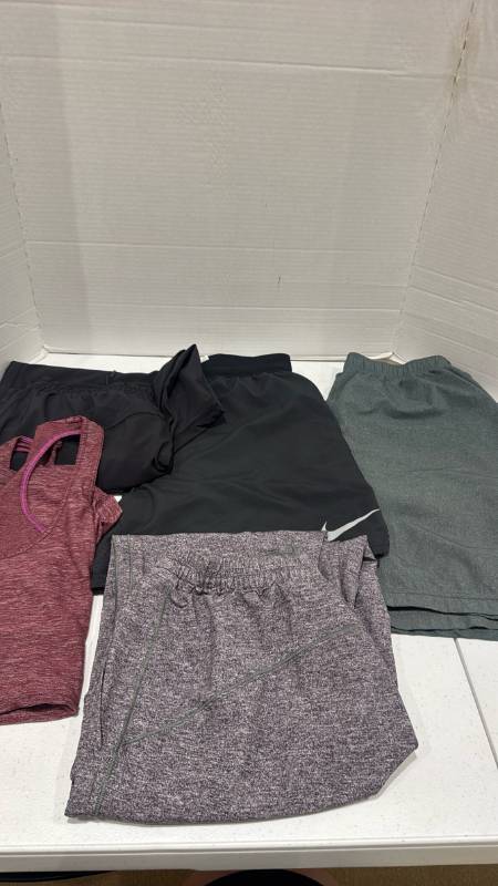 lot 2376 image: Lulu lemon and Nike pants and tops size m and l