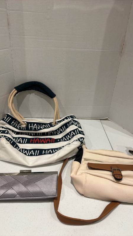 lot 2383 image: Lot of 3 Handbags Hawaii Print Tote, Silver Clutch, Cream Crossbody Bag