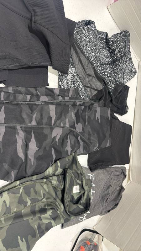 lot 2389 image: Lulu Lemon and Athleta and other workout pants and shorts size MP, 8