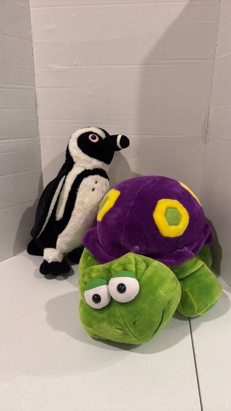 lot 2450 image: Large stuffed turtle, penguin and trex some need repaired trex is a puppet also