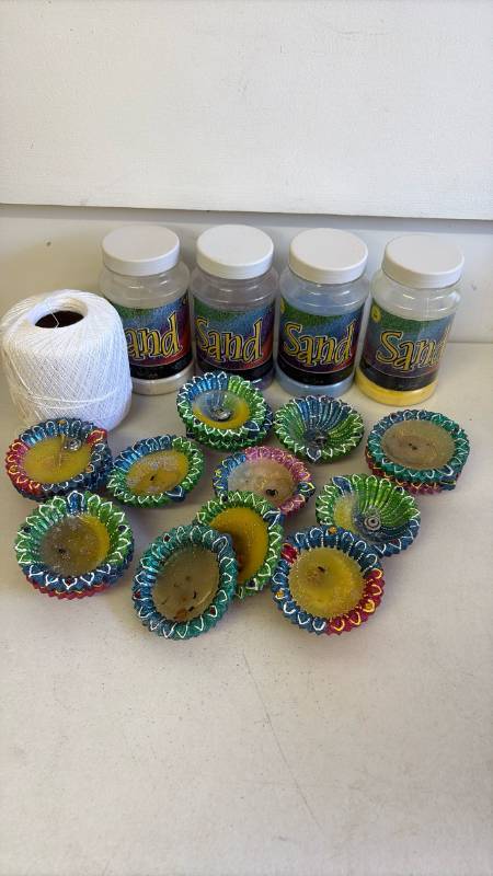 lot 3040 image: Crafting sand, thread, candles and container