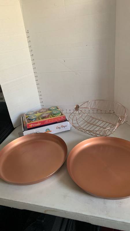 lot 3070 image: Home decor including copper plates, and Clay Diyas