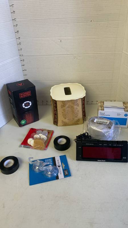 lot 3079 image: Alarm clock, Wunder heater , tissues dispenser, clothespins and more