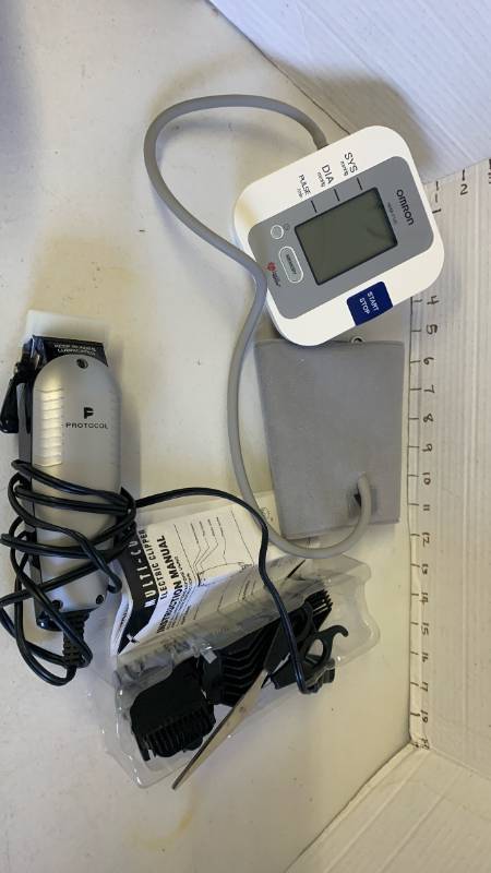 lot 3082 image: Omron HEM-712C Blood Pressure Monitor with Protocol Electric Hair Clipper Set