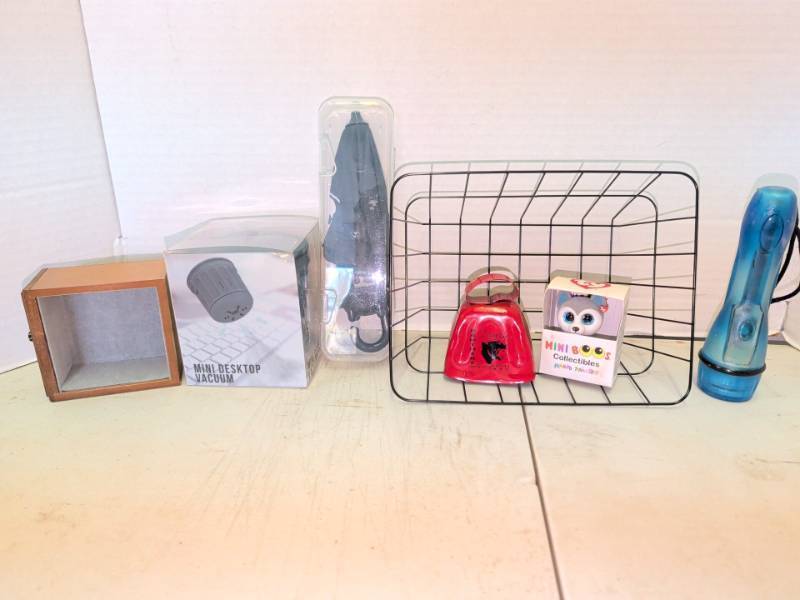 lot 3114 image: Assorted Lot Ty Mini Boos Collectible, Mini Desktop Vacuum, Drury Panthers Cowbell, Basket