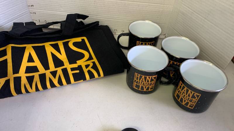lot 3122 image: Hans Zimmer Live Lot Black Tote Bag, 4 Black Mugs, Lanyards & VIP Card