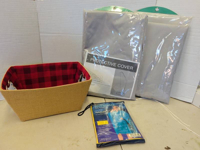 lot 3203 image: Cantilever Umbrella Protective Covers and poncho