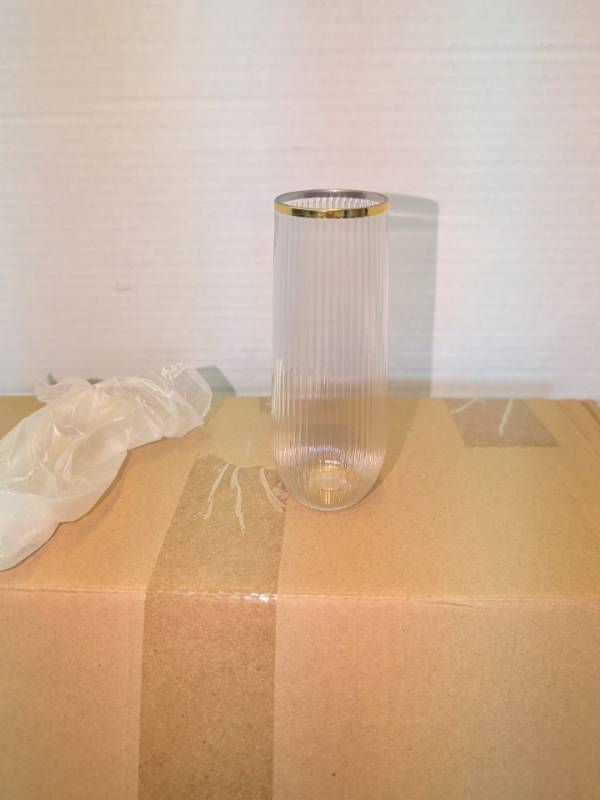 lot 3314 image: Ribbed Stemless Flute Drinking Glass with Gold-Tone Rim, Boxed Set disposables