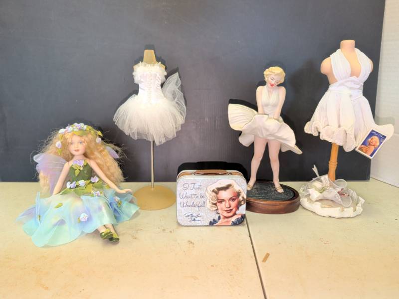 lot 3317 image: Marilyn Monroe Themed Lot Figurine, Mini Tin, Dress Forms and Fairy Doll