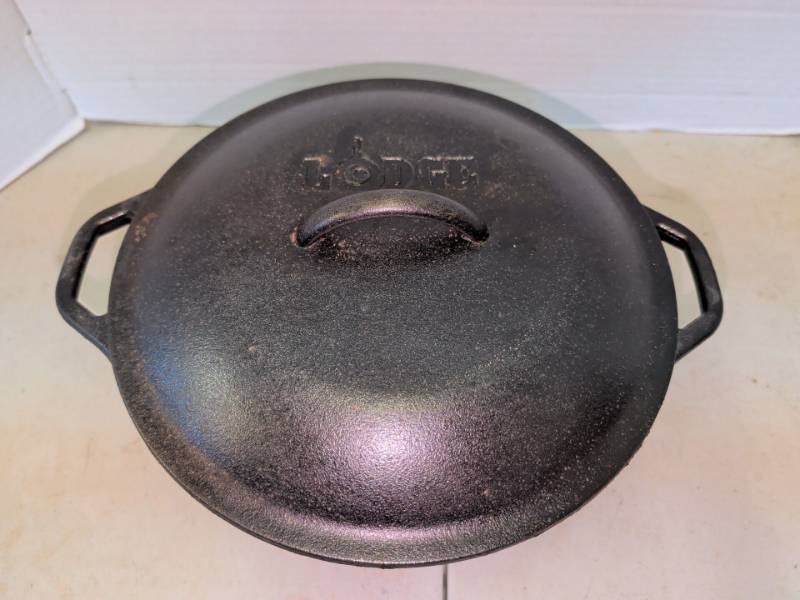 lot 3321 image: Lodge Dutch Oven with Lid 5in deep 10in wide