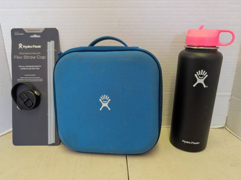 lot 3324 image: Hydro Flask Lot with Flex Straw Cap Pack, Blue Lunch Bag and Black Bottle