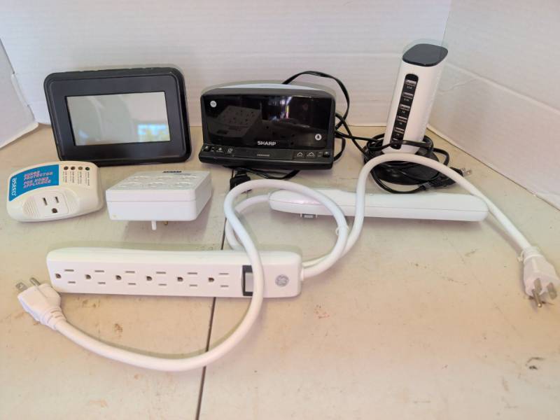 lot 3337 image: Lot of Power Strips, Surge Protectors, USB Charging Tower, Sharp Alarm Clock
