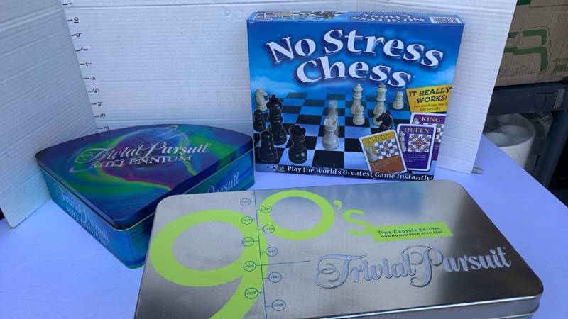 lot 3402 image: Trivial Pursuit 90s Time Capsule & Millennium Tins Plus No Stress Chess
