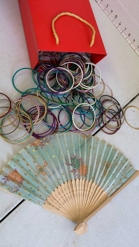 lot 3457 image: Bangle bracelets, and fan