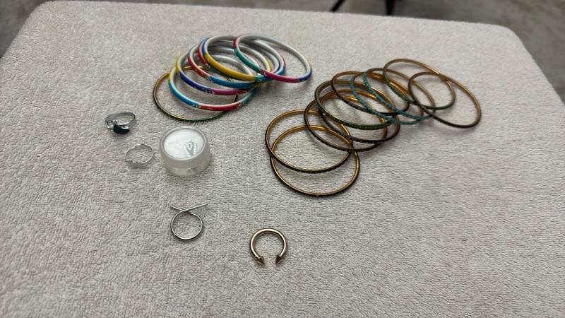 lot 1530 image: Lot of Assorted Bangle Bracelets and Rings, Multicolor and Gold Tone and more